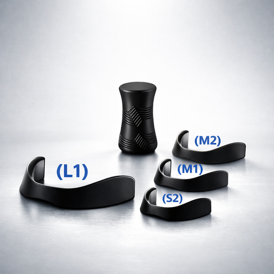 Set of black dental tools on a gray background