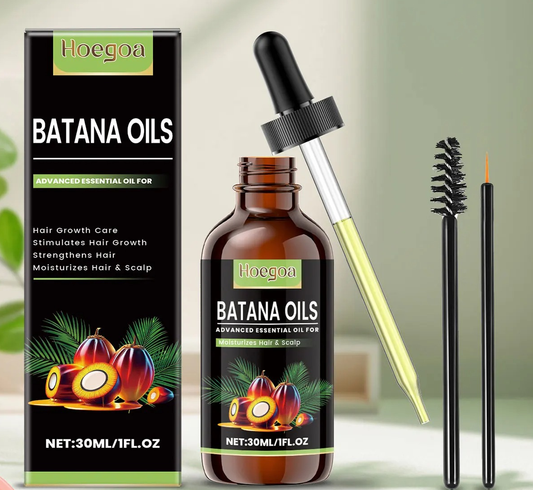 Batana Oils bottle with dropper and packaging on a light green background