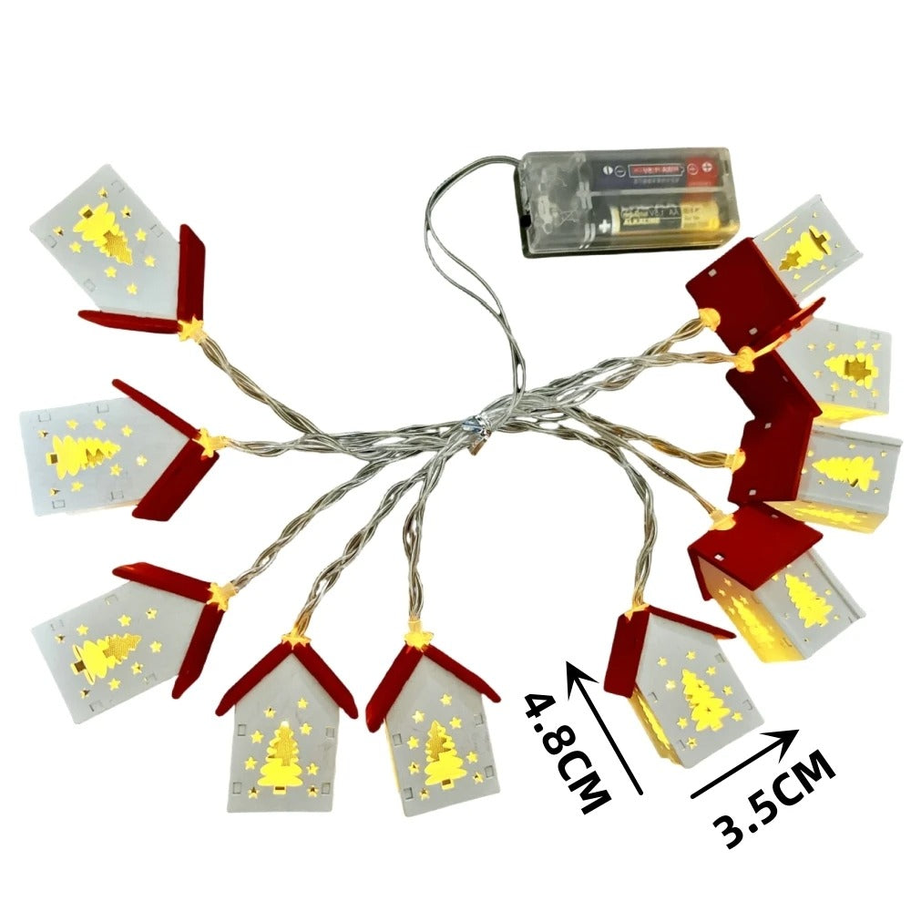 String lights with house-shaped bulbs on a white background